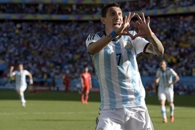 Argentina's Angel di Maria celebrates after scoring his side's only and winning goal in extra time during the World Cup round of 16 soccer match between Argentina and Switzerland at the Itaquerao Stadium in Sao Paulo, Brazil, Tuesday, July 1, 2014. Argentina defeated Switzerland 1-0 to move on to the quarterfinals. (AP Photo/Manu Fernandez)