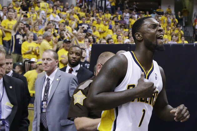 Indiana Pacers guard Lance Stephenson (1) returns to the floor against the Miami Heat during the second half of Game 5 of the NBA basketball Eastern Conference finals in Indianapolis, Wednesday, May 28, 2014. (AP Photo/Michael Conroy)