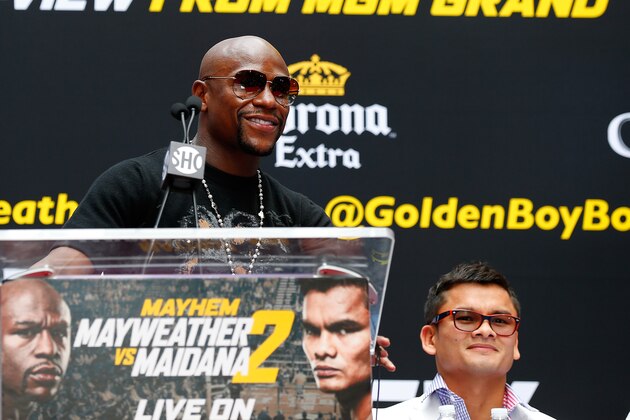 NEW YORK, NY - JULY 14: Floyd Mayweather Jr. speaks to the media during a news conference at the Pedestrian Walk in Times Square on July 14, 2014 in New York City. Floyd Mayweather Jr. and Marcos Maidana are scheduled to fight September 13, 2014 at the MGM Grand in Las Vegas. (Photo by Mike Stobe/Getty Images) NEW YORK, NY - JULY 14: Floyd Mayweather Jr. speaks to the media during a news conference at the Pedestrian Walk in Times Square on July 14, 2014 in New York City. Floyd Mayweather Jr. and Marcos Maidana are scheduled to fight September 13, 2014 at the MGM Grand in Las Vegas. (Photo by Mike Stobe/Getty Images)