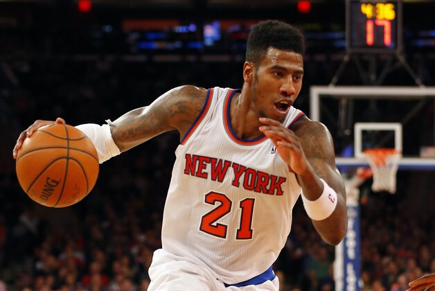 Apr 13, 2014; New York, NY, USA;  New York Knicks guard Iman Shumpert (21) drives to the basket during the second half against the Chicago Bulls at Madison Square Garden. New York Knicks defeat the Chicago Bulls 100-89. Mandatory Credit: Jim O'Connor-USA TODAY Sports