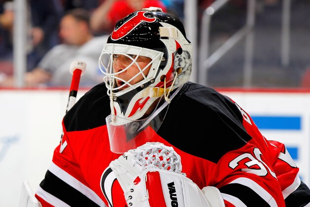 NEWARK, NJ - APRIL 11: Martin Brodeur #30 of the New Jersey Devils looks on against the New York Islanders during the game at the Prudential Center on April 11, 2014 in Newark, New Jersey. (Photo by Andy Marlin/NHLI via Getty Images)