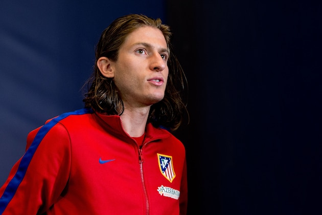 MADRID, SPAIN - MAY 19:  Player Filipe Luis of Atletico de Madrid leaves Club Atletico de Madrid press conference during the Media Day prior to UEFA Champions League Final between Club Atletico de Madrid and Real Madrid CF at Vicente Calderon stadium on May 19, 2014 in Madrid, Spain.  (Photo by Gonzalo Arroyo Moreno/Getty Images)