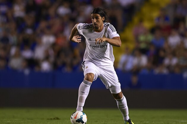 VALENCIA, SPAIN - OCTOBER 05:  Sami Khedira of Real Madrid runs with the ball during the La Liga match between Levante UD and Real Madrid at Ciutat de Valencia on October 5, 2013 in Valencia, Spain.  (Photo by Manuel Queimadelos Alonso/Getty Images)