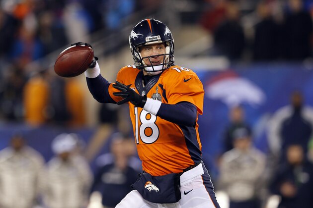 EAST RUTHERFORD, NJ - FEBRUARY 02:  Quarterback Peyton Manning #18 of the Denver Broncos looks to pass against the Seattle Seahawks during Super Bowl XLVIII at MetLife Stadium on February 2, 2014 in East Rutherford, New Jersey.  (Photo by Kevin C. Cox/Getty Images)