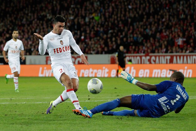 LILLE, FRANCE - NOVEMBER 03: Emmanuel Riviere of Monaco has his shot saved by Lille goalkeeper Vincent Enyeama during the French Ligue 1 match between OSC Lille and AS Monaco at the Grand Stade Metropole Villeneuve-d'Ascq on November 3, 2013 in Lille, France.  (Photo by Harry Engels/Getty Images)