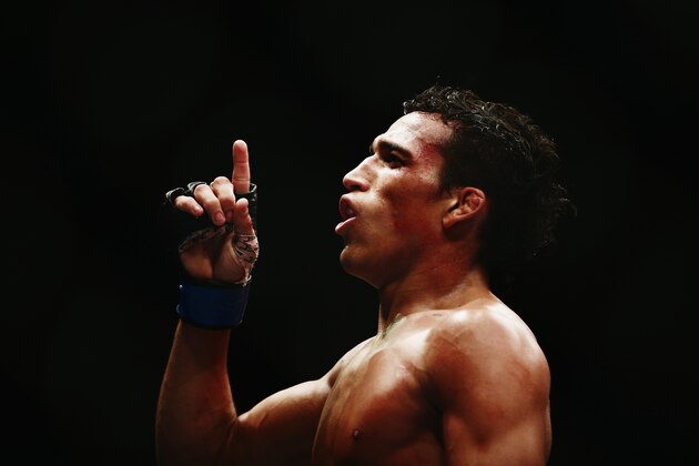 AUCKLAND, NEW ZEALAND - JUNE 28:  Charles Oliveira of Brazil celebrates after winning the UFC Featherweight bout between Charles Oliveira of Brazil and Hatsu Hioki of Japan on June 28, 2014 in Auckland, New Zealand.  (Photo by Hannah Peters/Getty Images)
