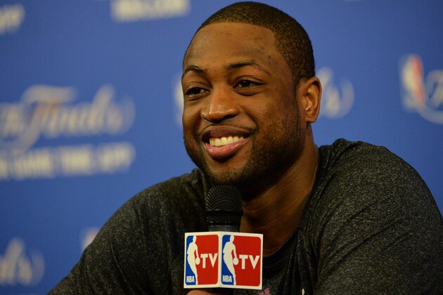 Jun 11, 2014; Miami, FL, USA; Miami Heat guard Dwyane Wade (3) speaks to the media prior to practice before game four of the 2014 NBA Finals against the San Antonio Spurs at American Airlines Arena. Mandatory Credit: Steve Mitchell-USA TODAY Sports Jun 11, 2014; Miami, FL, USA; Miami Heat guard Dwyane Wade (3) speaks to the media prior to practice before game four of the 2014 NBA Finals against the San Antonio Spurs at American Airlines Arena. Mandatory Credit: Steve Mitchell-USA TODAY Sports