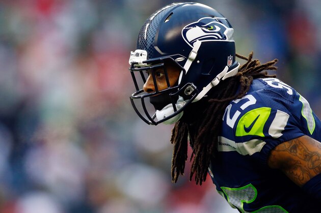 SEATTLE, WA - JANUARY 19:  Cornerback Richard Sherman #25 of the Seattle Seahawks looks on prior to the 2014 NFC Championship against the San Francisco 49ers at CenturyLink Field on January 19, 2014 in Seattle, Washington.  (Photo by Jonathan Ferrey/Getty Images)
