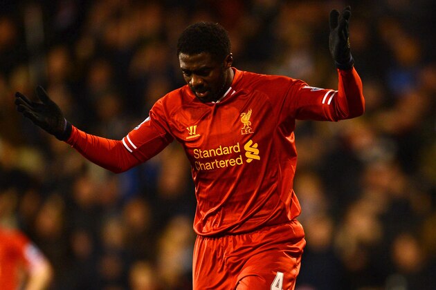 LONDON, ENGLAND - FEBRUARY 12:  Kolo Toure of Liverpool reacts after he scored an own goal during the Barclays Premier League match between Fulham and Liverpool at Craven Cottage on February 12, 2014 in London, England.  (Photo by Mike Hewitt/Getty Images)