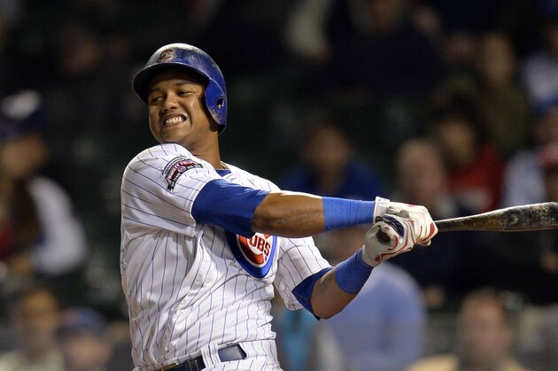 CHICAGO, IL - JUNE 25:  Starlin Castro #13 of the Chicago Cubs strikes out during the ninth inning against the Cincinnati Reds at Wrigley Field on June 25, 2014 in Chicago, Illinois. The Reds defeated the Cubs 4-1.  (Photo by Brian Kersey/Getty Images)