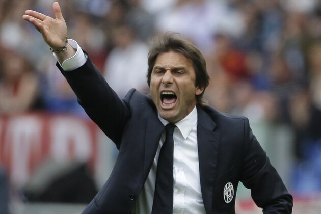 Juventus coach Antonio Conte shouts during an Italian Serie A soccer match between Roma and Juventus at Rome's Olympic stadium, Sunday, May 11, 2014. (AP Photo/Alessandra Tarantino)