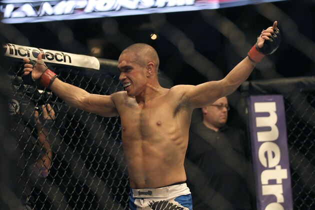 Chris Cariaso celebrates after beating Josh Ferguson in a UFC on Fuel 4 Mixed Martial Arts flyweight bout in San Jose, Calif., Wednesday, July 11, 2012. (AP Photo/Jeff Chiu) Chris Cariaso celebrates after beating Josh Ferguson in a UFC on Fuel 4 Mixed Martial Arts flyweight bout in San Jose, Calif., Wednesday, July 11, 2012. (AP Photo/Jeff Chiu)