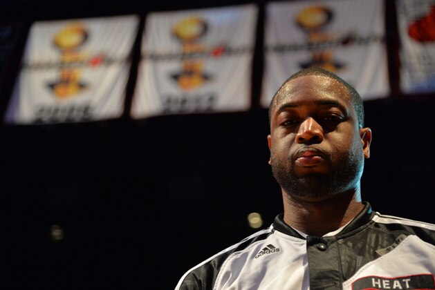 MIAMI, FL - JUNE 12: Dwyane Wade #3 of the Miami Heat looks on against the San Antonio Spurs during Game Six of the 2014 NBA Finals on June 12, 2014 at American Airlines Arena in Miami, Florida. NOTE TO USER: User expressly acknowledges and agrees that, by downloading and or using this photograph, User is consenting to the terms and conditions of the Getty Images License Agreement. Mandatory Copyright Notice: Copyright 2014 NBAE (Photo by Jesse D. Garrabrant/NBAE via Getty Images)