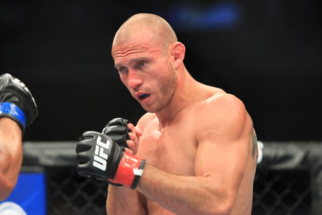 Aug 28, 2013; Indianapolis, IN, USA; Donald Cerrone fights Rafael dos Anjos (not pictured) during a UFC match at Bankers Life Fieldhouse. Mandatory Credit: Pat Lovell-USA TODAY Sports