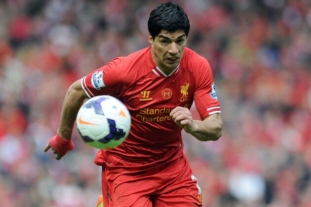 Liverpool's Luis Suarez during their English Premier League soccer match against Newcastle United at Anfield in Liverpool, England, Sunday May 11, 2014. (AP Photo/Clint Hughes)