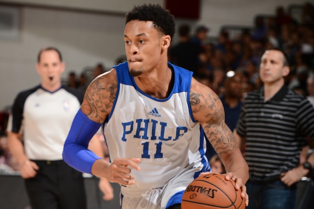 LAS VEGAS, NV - JULY 14: K.J. McDaniels #11 of the Philadelphia 76ers handles the ball against the Cleveland Cavaliers at the Samsung NBA Summer League 2014 on July 14, 2014 at the Cox Pavilion in Las Vegas, Nevada. NOTE TO USER: User expressly acknowledges and agrees that, by downloading and or using this photograph, User is consenting to the terms and conditions of the Getty Images License Agreement. Mandatory Copyright Notice: Copyright 2014 NBAE (Photo by Garrett Ellwood/NBAE via Getty Images)