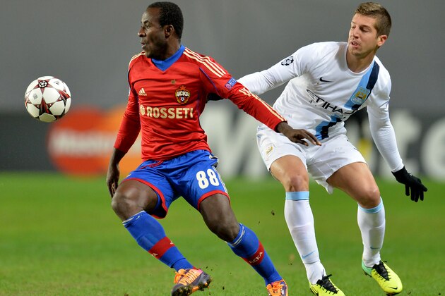 KHIMKI, RUSSIA - OCTOBER 23: Seydou Doumbia (L) of PFC CSKA Moscow in action against Matija Nastasic of Manchester City FC during the UEFA Champions League Group D match between PFC CSKA Moscow and Manchester City FC at the Arena Khimki Stadium on October 23, 2013 in Khimki, Russia.  (Photo by Epsilon/Getty Images)