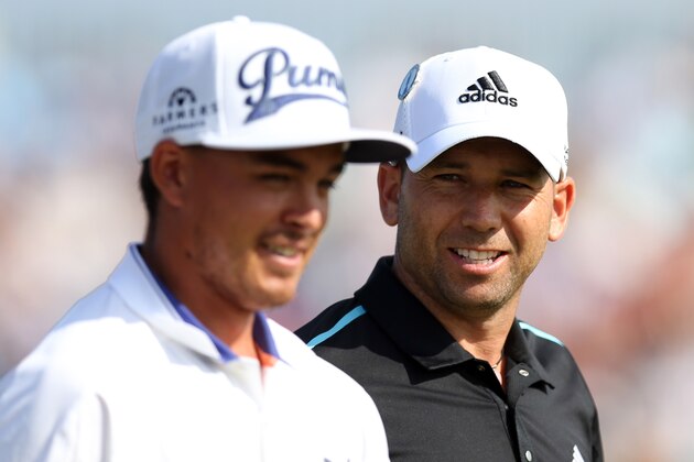 Sergio Garcia of Spain, right, and Rickie Fowler of the US walk up to the 4th tee during the first day of the British Open Golf championship at the Royal Liverpool golf club, Hoylake, England, Thursday July 17, 2014. (AP Photo/Scott Heppell)