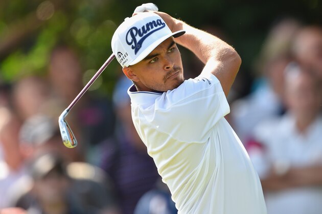 HOYLAKE, ENGLAND - JULY 17:  Rickie Fowler of the United States tees off on the fifth hole during the first round of The 143rd Open Championship at Royal Liverpool on July 17, 2014 in Hoylake, England.  (Photo by Stuart Franklin/Getty Images)