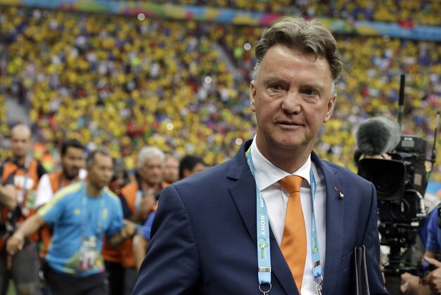 Netherlands' head coach Louis van Gaal arrives for the World Cup third-place soccer match between Brazil and the Netherlands at the Estadio Nacional in Brasilia, Brazil, Saturday, July 12, 2014. (AP Photo/Hassan Ammar)