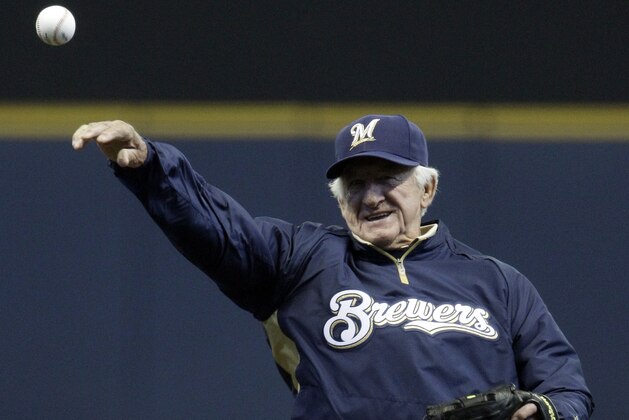 Milwaukee Brewers radio announcer Bob Uecker throws out the ceremonial first pitch before Game 1 of baseball's National League division series against the Arizona Diamondbacks Saturday, Oct. 1, 2011, in Milwaukee. (AP Photo/Morry Gash)