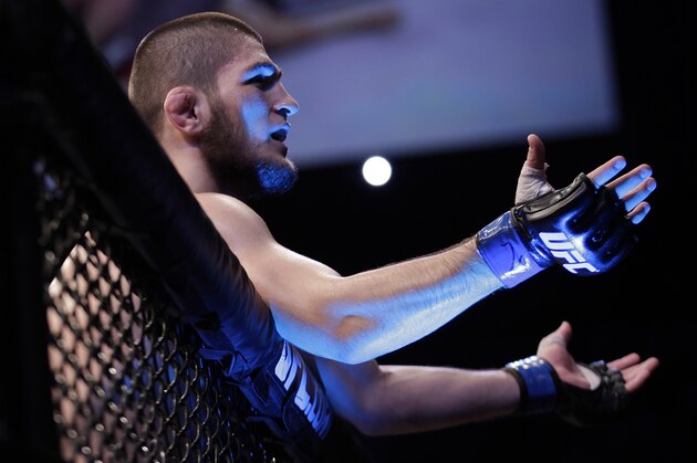 Khabib Nurmagomedov, from Russia, celebrates after Thiago Tavares, from Brazil,  during their lightweight mixed martial arts bout at the Ultimate Fighting Championship (UFC) in Sao Paulo, Brazil, Saturday, Jan. 19, 2013. (AP Photo/Andre Penner)