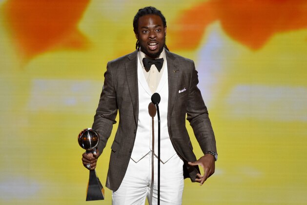 Richard Sherman, of the Seattle Seahawks, accepts the award for best breakthrough athlete at the ESPY Awards at the Nokia Theatre on Wednesday, July 16, 2014, in Los Angeles. (Photo by John Shearer/Invision/AP) Richard Sherman, of the Seattle Seahawks, accepts the award for best breakthrough athlete at the ESPY Awards at the Nokia Theatre on Wednesday, July 16, 2014, in Los Angeles. (Photo by John Shearer/Invision/AP)