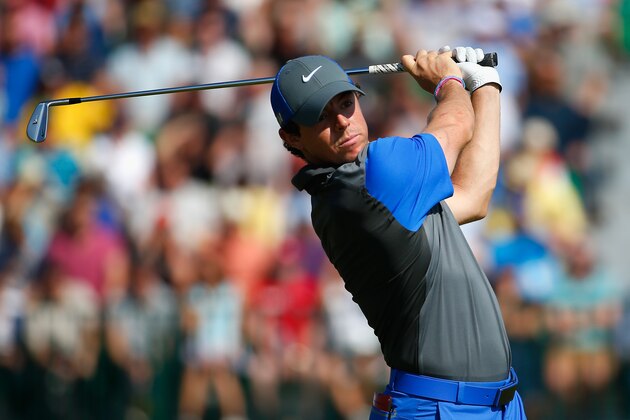 HOYLAKE, ENGLAND - JULY 17:  Rory McIlroy of Northern Ireland hits his tee shot on the fourth hole during the first round of The 143rd Open Championship at Royal Liverpool on July 17, 2014 in Hoylake, England.  (Photo by Tom Pennington/Getty Images)