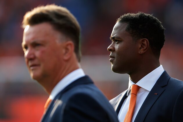 ROTTERDAM, NETHERLANDS - MAY 31:  Netherlands Manager, Louis van Gaal (L) and coach, Patrick Kluivert look on prior to the International Friendly match between Netherlands and Ghana at De Kuip on May 31, 2014 in Rotterdam, Netherlands.  (Photo by Dean Mouhtaropoulos/Getty Images)