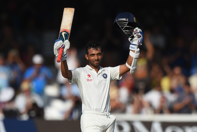 LONDON, ENGLAND - JULY 17:  India batsman Ajinkya Rahane celebrates after reaching his century during day one of 2nd Investec Test match between England and India at Lord's Cricket Ground on July 17, 2014 in London, United Kingdom.  (Photo by Stu Forster/Getty Images)