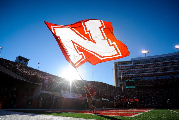 LINCOLN, NE - NOVEMBER 16: A flag is displayed after the Nebraska Cornhuskers score against the Michigan State Spartans during their game at Memorial Stadium on November 16, 2013 in Lincoln, Nebraska. (Photo by Eric Francis/Getty Images) LINCOLN, NE - NOVEMBER 16: A flag is displayed after the Nebraska Cornhuskers score against the Michigan State Spartans during their game at Memorial Stadium on November 16, 2013 in Lincoln, Nebraska. (Photo by Eric Francis/Getty Images)