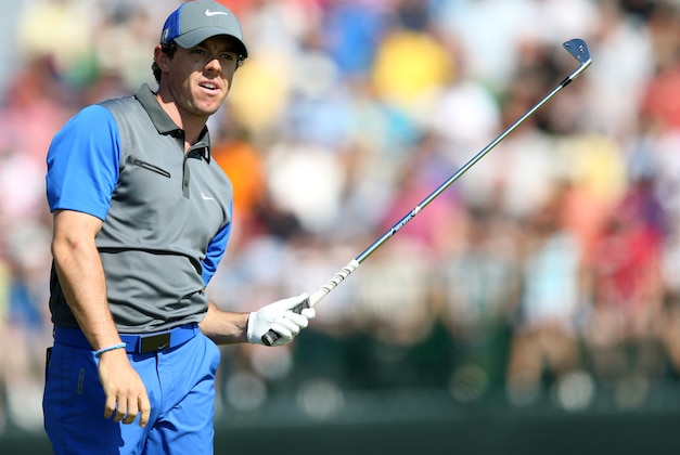 Rory McIlroy of Northern Ireland watches his shot off the 4th tee during the first day of the British Open Golf championship at the Royal Liverpool golf club, Hoylake, England, Thursday July 17, 2014. (AP Photo/Scott Heppell)