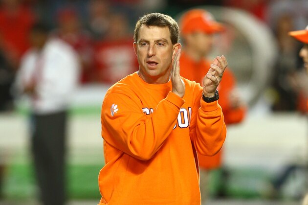 MIAMI GARDENS, FL - JANUARY 03:  Head coach Dabo Swinney of the Clemson Tigers looks on during warm ups prior to the Discover Orange Bowl against the Ohio State Buckeyes at Sun Life Stadium on January 3, 2014 in Miami Gardens, Florida.  (Photo by Streeter Lecka/Getty Images)