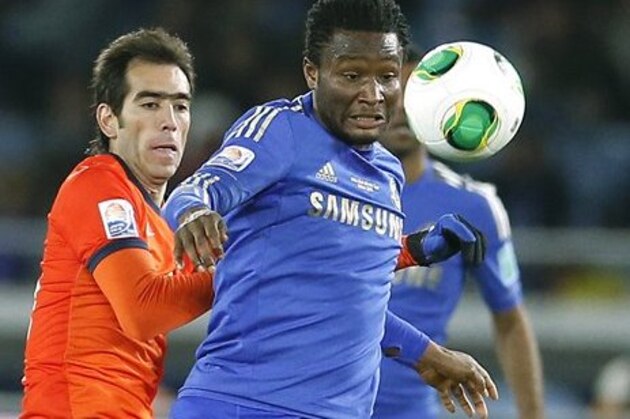 Chelsea FC's John Obi Mikel, right, fights for the ball with CF Monterrey's Cesar Delgado during their semifinal match at the FIFA Club World Cup soccer tournament in Yokohama, near Tokyo, Thursday, Dec. 13, 2012. (AP Photo/Shizuo Kambayashi)