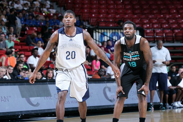 LAS VEGAS, NV - JULY 17: DeQuan Jones #20 of the New Orleans Pelicans battles for position against P.J. Hairston #18 of the Charlotte Hornets during the Samsung NBA Summer League 2014 on July 17, 2014 at the Cox Pavilion in Las Vegas, Nevada. NOTE TO USER: User expressly acknowledges and agrees that, by downloading and or using this photograph, User is consenting to the terms and conditions of the Getty Images License Agreement. Mandatory Copyright Notice: Copyright 2014 NBAE (Photo by Jack Arent/NBAE via Getty Images)