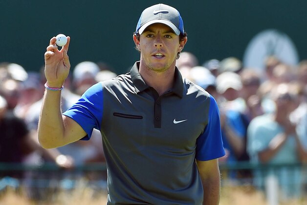 Jul 17, 2014; Wirral, Merseyside, GBR; Rory McIlroy walks off the 18th green during after finishing the first round of The 143rd Open Championship at the Royal Liverpool Golf Club. Mandatory Credit: Ian Rutherford-USA TODAY Sports Jul 17, 2014; Wirral, Merseyside, GBR; Rory McIlroy walks off the 18th green during after finishing the first round of The 143rd Open Championship at the Royal Liverpool Golf Club. Mandatory Credit: Ian Rutherford-USA TODAY Sports