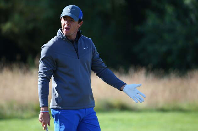HOYLAKE, ENGLAND - JULY 17:  Rory McIlroy of Northern Ireland waits on the practice ground during the first round of The 143rd Open Championship at Royal Liverpool on July 17, 2014 in Hoylake, England.  (Photo by Matthew Lewis/Getty Images)