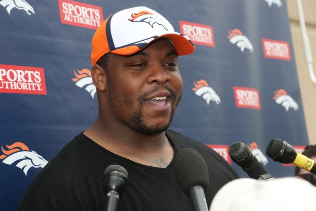 Denver Broncos defensive tackle Terrance Knighton talks to reporters after players took part in the team's NFL football minicamp at the Broncos' headquarters in Englewood, Colo., on Thursday, May 29, 2014. (AP Photo/David Zalubowski)
