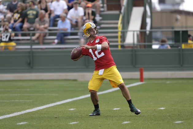 Green Bay Packers quarterback Aaron Rodgers during an NFL football mini camp practice Tuesday, June. 17, 2014, in Green Bay, Wis. (AP Photo/Mike Roemer)