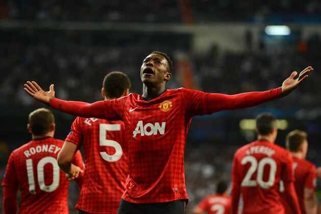MADRID, SPAIN - FEBRUARY 13: Danny Welbeck of Manchester United celebrates scoring the opening goal  during the UEFA Champions League Round of 16 first leg match between Real Madrid and Manchester United at Estadio Santiago Bernabeu on February 13, 2013 in Madrid, Spain.  (Photo by Mike Hewitt/Getty Images)