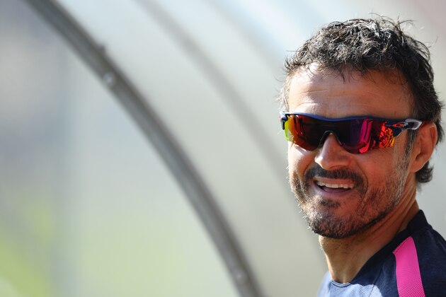 FC Barcelona's head coach Luis Enrique looks on during a training session at the Sports Center FC Barcelona Joan Gamper in San Joan Despi, Spain, Friday, July 18, 2014.  (AP Photo/Manu Fernandez)