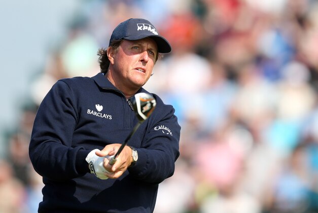 Phil Mickelson of the US watches his shot off the 3rd tee during the second day of the British Open Golf championship at the Royal Liverpool golf club, Hoylake, England, Friday July 18, 2014. (AP Photo/Scott Heppell)