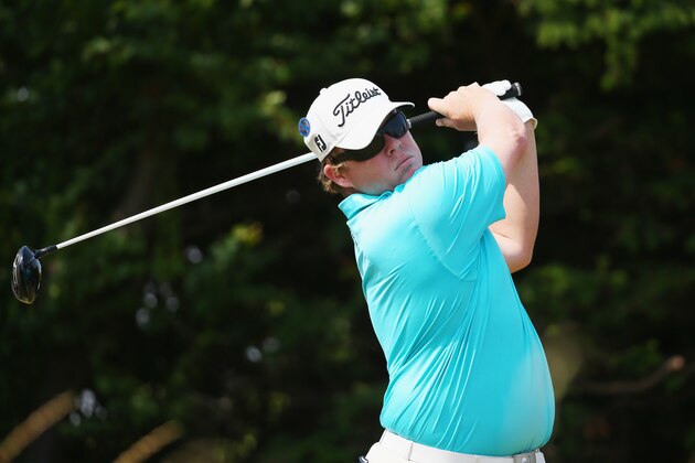 HOYLAKE, ENGLAND - JULY 18:  George Coetzee of South Africa watches his tee shot on the 18th hole during the second round of The 143rd Open Championship at Royal Liverpool on July 18, 2014 in Hoylake, England.  (Photo by Matthew Lewis/Getty Images)