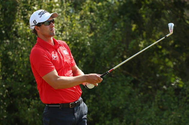 HOYLAKE, ENGLAND - JULY 18: Adam Scott of Australia watches his tee shot on the eighth hole during the second round of The 143rd Open Championship at Royal Liverpool on July 18, 2014 in Hoylake, England. (Photo by Mike Ehrmann/Getty Images) HOYLAKE, ENGLAND - JULY 18: Adam Scott of Australia watches his tee shot on the eighth hole during the second round of The 143rd Open Championship at Royal Liverpool on July 18, 2014 in Hoylake, England. (Photo by Mike Ehrmann/Getty Images)