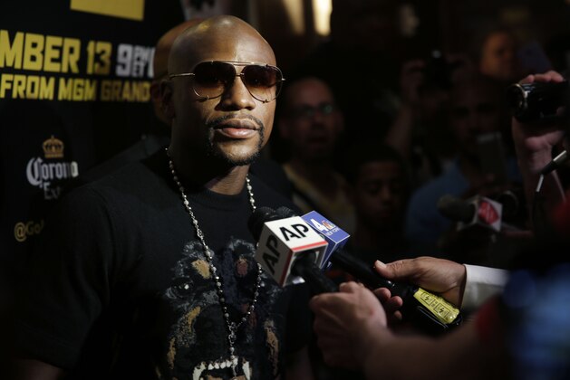 Floyd Mayweather talks to reporters during a news conference in New York, Monday, July 14, 2014. Mayweather will fight Marcos Maidana for the second time in Las Vegas, Nevada on Sept. 13, 2014. (AP Photo/Seth Wenig)