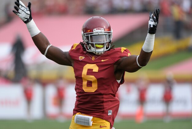 Oct 26, 2013; Los Angeles, CA, USA; USC Trojans safety Josh Shaw (6) tries to get the crowd going during the third quarter of the Trojans 19-3 win over the Utah Utes at Los Angeles Memorial Coliseum. Mandatory Credit: Robert Hanashiro-USA TODAY Sports