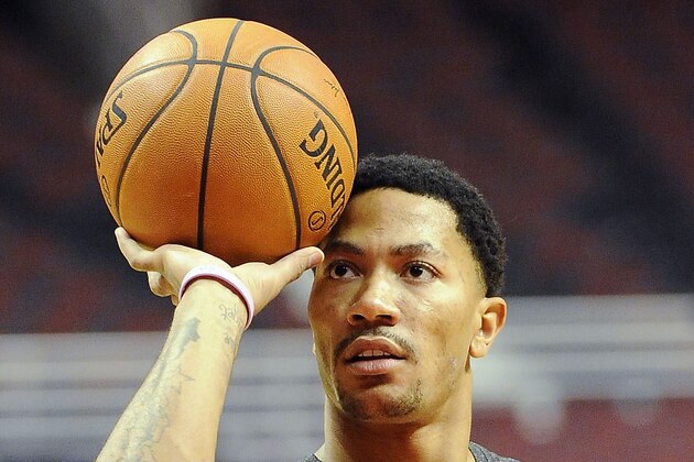 Feb 13, 2014; Chicago, IL, USA; Chicago Bulls point guard Derrick Rose (1) shoots free throws before the game between the Chicago Bulls and the Brooklyn Nets at the United Center. Mandatory Credit: David Banks-USA TODAY Sports