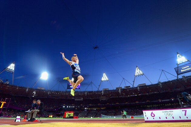 LONDON, ENGLAND - AUGUST 04:  Greg Rutherford of Great Britain on his way to winning the gold medal in the Men's Long Jump Final on Day 8 of the London 2012 Olympic Games at Olympic Stadium on August 4, 2012 in London, England.  (Photo by Stu Forster/Getty Images)