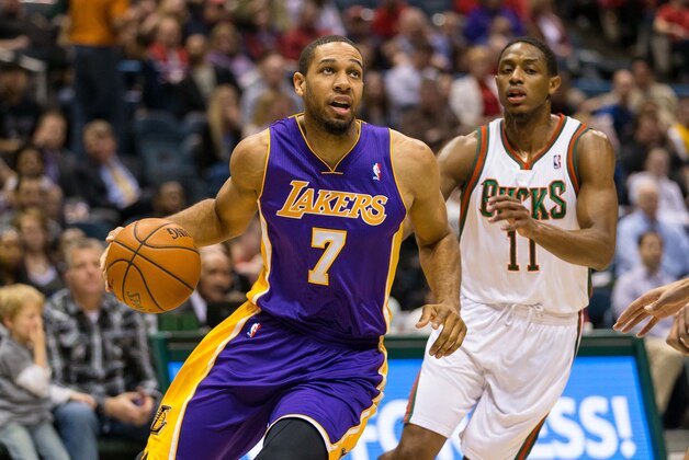 Mar 27, 2014; Milwaukee, WI, USA; Los Angeles Lakers forward Xavier Henry (7) during the game against the Milwaukee Bucks at BMO Harris Bradley Center.  Milwaukee won 108-105.  Mandatory Credit: Jeff Hanisch-USA TODAY Sports