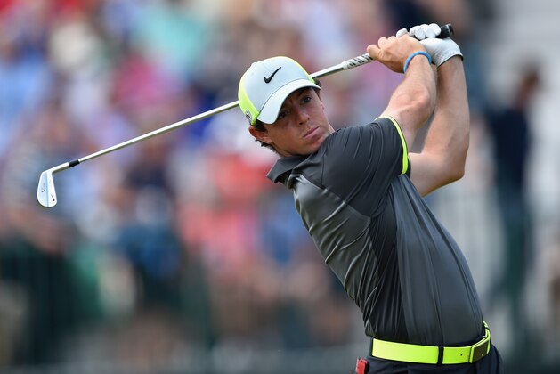 HOYLAKE, ENGLAND - JULY 18: Rory McIlroy of Northern Ireland watches his tee shot on the fourth hole during the second round of The 143rd Open Championship at Royal Liverpool on July 18, 2014 in Hoylake, England. (Photo by Stuart Franklin/Getty Images) HOYLAKE, ENGLAND - JULY 18: Rory McIlroy of Northern Ireland watches his tee shot on the fourth hole during the second round of The 143rd Open Championship at Royal Liverpool on July 18, 2014 in Hoylake, England. (Photo by Stuart Franklin/Getty Images)
